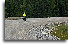 Biker on Gravel Road::Labrador Highway, Labrador, Canada::