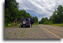 Inflating punctured tire::Maine, USA::