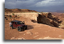 Taking break on the rock::Island in the Sky, Canyonlands, Utah, USA::