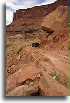 Under Huge Boulder::Island in the Sky, Canyonlands, Utah, USA::